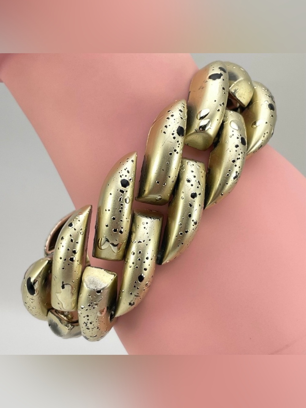 Oversized Gold Tone Chunky Link Bracelet with Distressed Black Speckle Finish.